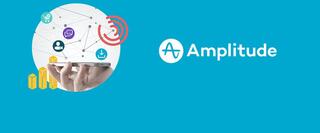 hand holding mobile phone with Amplitude logo